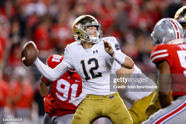 Notre Dame Fighting Irish quarterback Tyler Buchner throws a pass during the fourth quarter of the college football game between the Notre Dame...