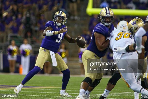 Washington Huskies quarterback Michael Penix Jr. Throws the ball during a college football game between the Kent State Golden Flashes and the...