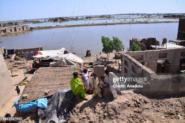 View of damaged houses hit by floodwater following flash flood in Sewan Sharif, southern Sindh province, Pakistan on September 04, 2022 The death...