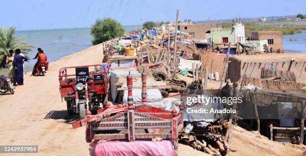 View of damaged houses hit by floodwater following flash flood in Sewan Sharif, southern Sindh province, Pakistan on September 04, 2022 The death...