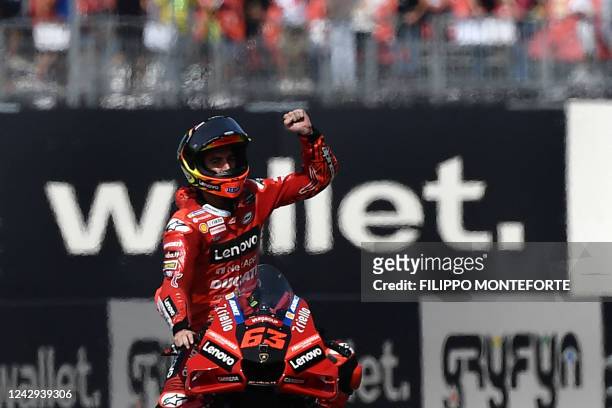 Ducati Lenovo's Italian rider Francesco Bagnaia celebrates victory after the San Marino MotoGP race at the Misano World Circuit Marco-Simoncelli in...