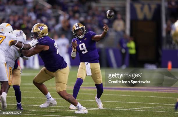 Washington Huskies quarterback Michael Penix Jr. Throws during a NCAA non-conference football game between the Kent State Golden Flashes and the...