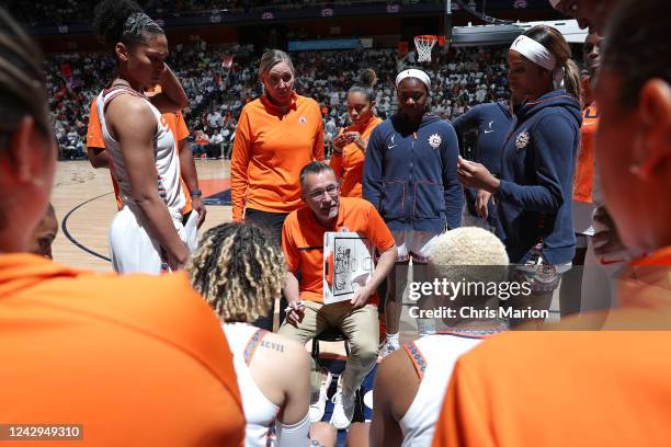 Head Coach Curt Miller of the Connecticut Sun speaks with his players during the game against the Chicago Sky during Round 2 Game 3 of the 2022 WNBA...