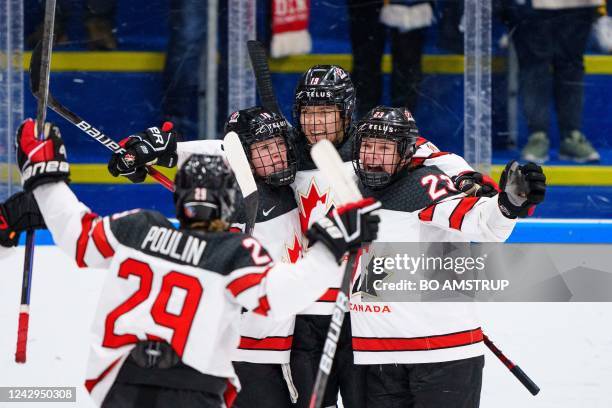 Canada's team celebrates the 0-2 during the women's IIHF World Championship ice hockey gold medal match between USA and Canada in Herning, Denmark,...