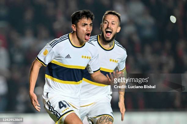 Luca Langoni of Boca Juniors celebrates with teammate Darío Benedetto after scoring his team's second goal during a match between Colón and Boca...