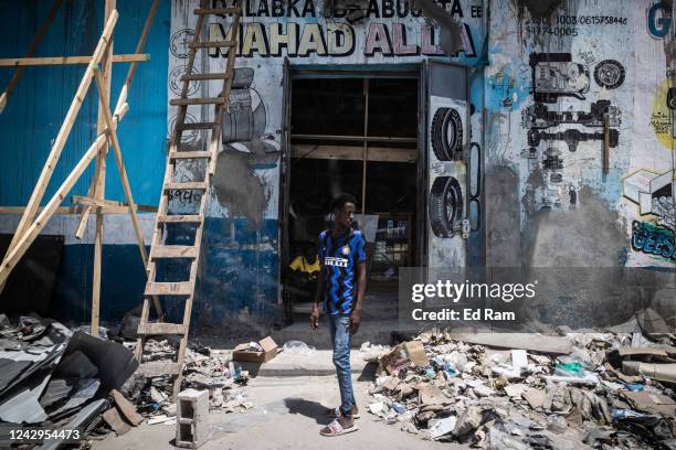 Rubble lies on the floor near the site of a recent Al Shabab attack on the Hayat Hotel, seen through the window of an armoured car on September 4,...