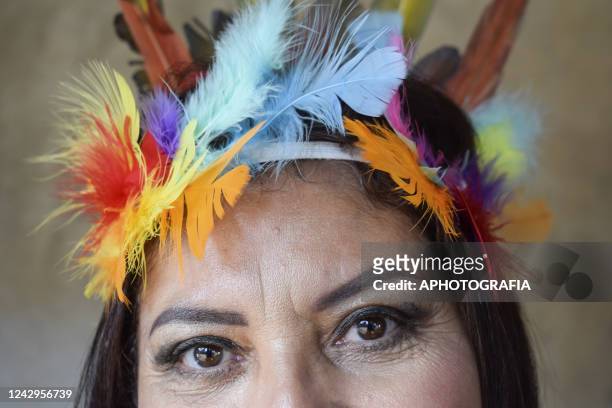 An indigenous woman looks on during a ceremony on International Indigenous Women's Day on September 4, 2022 in Sonsonate, El Salvador. International...