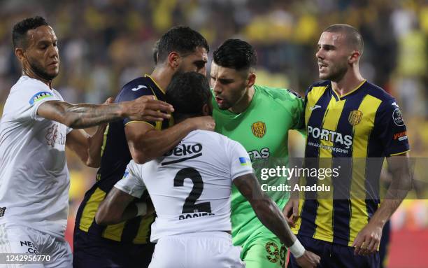 Roiser of Besiktas argues with Bahadir Han Gungordu of MKE Ankaragucu during Turkish Super Lig week 5 match between MKE Ankaragucu and Besiktas at...