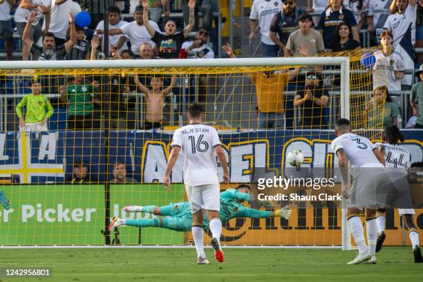 Jonathan Bond of Los Angeles Galaxy tries to make a save on a penalty kick from Johnny Russell of Sporting Kansas City during the match at the...