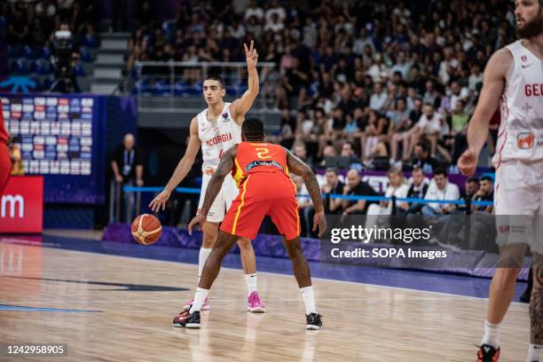 Rati Andronikashvili of Georgia and Lorenzo Brown of Spain seen in action during Day 3 Group A of the FIBA Eurobasket 2022 between Spain and Georgia...
