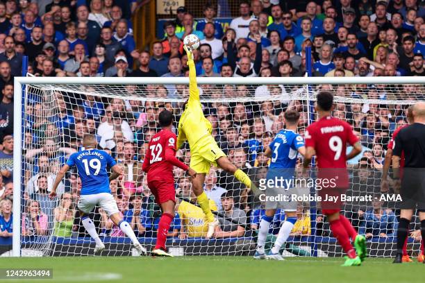 Alisson Becker of Liverpool makes a save during the Premier League match between Everton FC and Liverpool FC at Goodison Park on September 3, 2022 in...