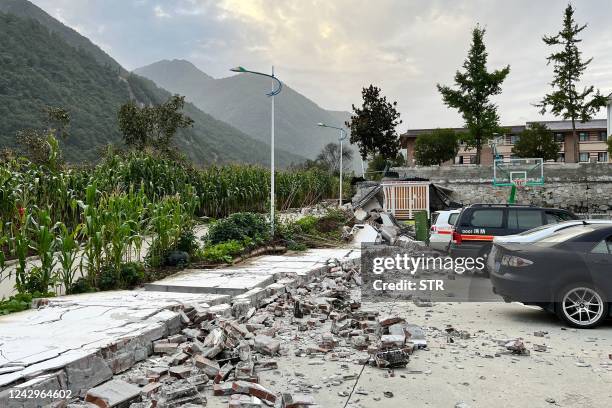 This photo shows the aftermath of a 6.6-magnitude earthquake in Hailuogou in China's southwestern Sichuan province on September 5, 2022. - China OUT...