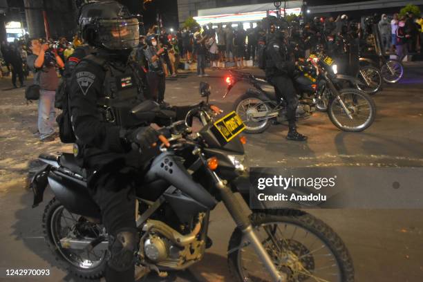 People clash with police officers during a demonstration after the government raised fuel prices in Makassar, South Sulawesi, Indonesia on September...