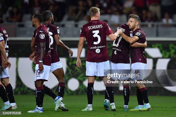 Nikola Vlasic of Torino FC celebrates the opening goal with team mates during the Serie A match between Torino FC and US Lecce at Stadio Olimpico di...