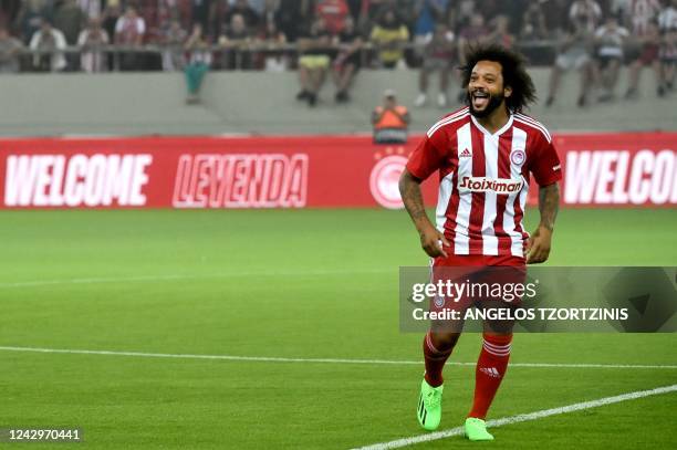 Olympiakos' new Brazilian player Marcelo reacts during his official presentation at the Georgios Karaiskakis stadium in Athens on September 5, 2022.