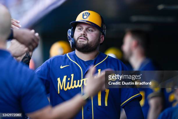 Rowdy Tellez of the Milwaukee Brewers celebrates scoring a run in the sixth inning against the Colorado Rockies at Coors Field on September 5, 2022...