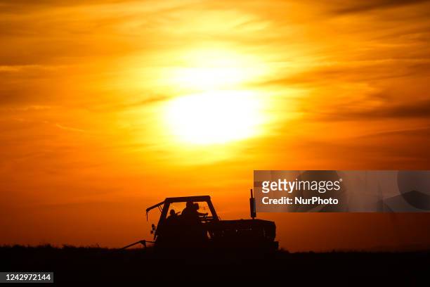 Farm tractor works on a field in Poland on September 5, 2022.