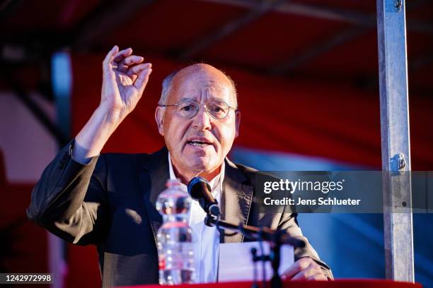 Gregor Gysi of the "Die Linke" party, speaks to supporters of the left-wing Die Linke party during a gather in the city center to demand measures...