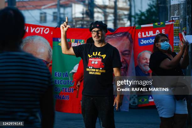 Messias Figueiredo pose for a picture during an event in support of Brazilian presidential candidate for the leftist Workers Party and former...