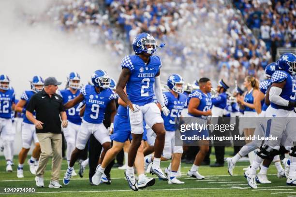 Kentucky wideout Barion Brown runs onto the field before Saturday&apos;s win against Miami . With the College Football Playoff apparently headed...