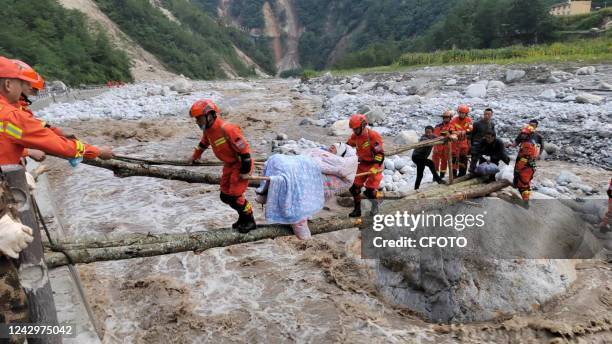 Rescuers transfer injured people in Luding county, Ganzi prefecture, Sichuan Province, China, Sept 5, 2022. A 6.8-magnitude earthquake struck Luding...