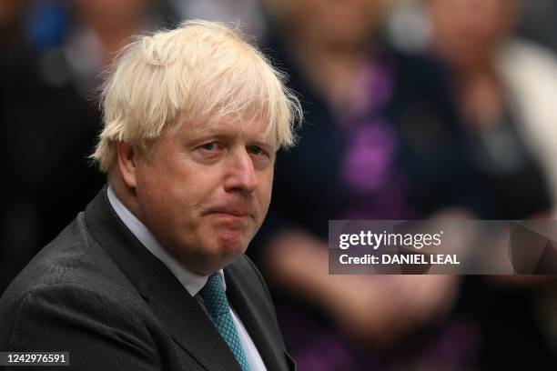 Britain's outgoing Prime Minister Boris Johnson delivers his final speech outside 10 Downing Street in central London on September 6 before heading...