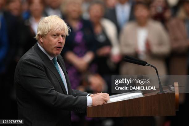 Britain's outgoing Prime Minister Boris Johnson delivers his final speech outside 10 Downing Street in central London on September 6 before heading...