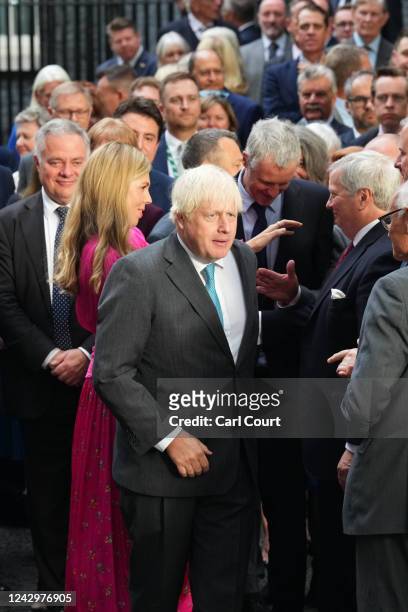 British Caretaker Prime Minister Boris Johnson and wife Carrie depart after his farewell address before his official resignation at Downing Street on...