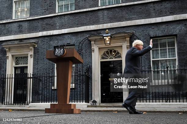 British Prime Minister Boris Johnson reacts to Conservative party members after delivering a farewell address before his official resignation at...