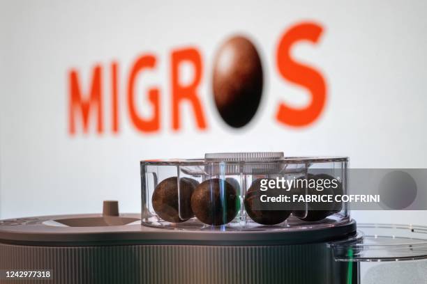 Picture taken on September 6, 2022 in Zurich shows new coffee pods on the top of a new coffee machine system during a press conference by...