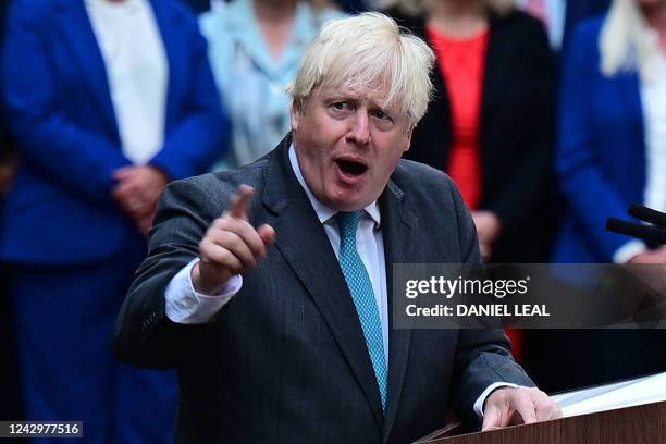 Britain's outgoing Prime Minister Boris Johnson delivers his final speech outside 10 Downing Street in central London on September 6 before heading...