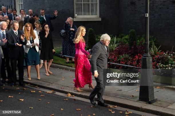 British Prime Minister Boris Johnson leaves with his wife Carrie after delivering a farewell address before his official resignation at Downing...