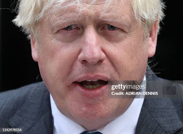 Britain's outgoing Prime Minister Boris Johnson delivers his final speech outside 10 Downing Street in central London on September 6 before heading...