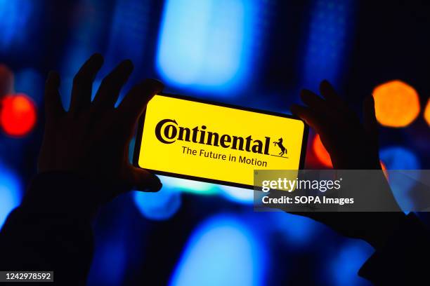In this photo illustration, the Continental AG logo is displayed on a smartphone screen.