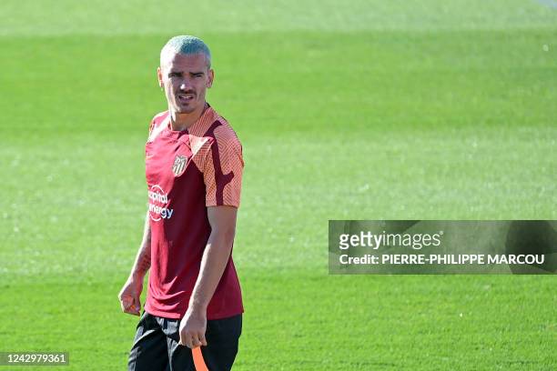 Atletico Madrid's French forward Antoine Griezmann attends a training session in Majadahonda, near Madrid on September 6 on the eve of their UEFA...