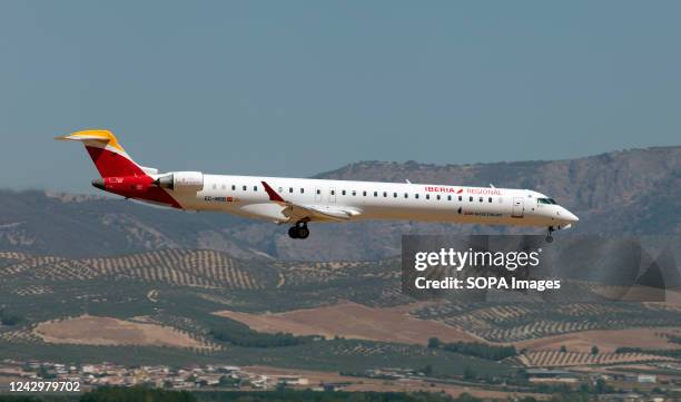 An Iberia Regional Bombardier CRJ-1000 about to land at Granada/Jaén Federico García Lorca airport. The Bombardier CRJ700, CRJ900, and CRJ1000 are a...