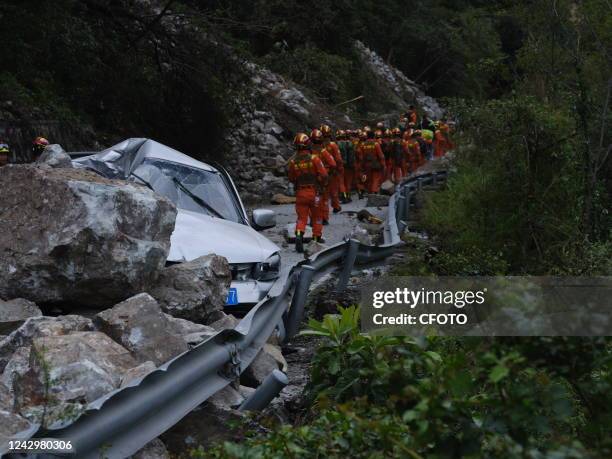 Rescuers search for victims on a mountain in Luding county, Ganzi prefecture, Southwest China's Sichuan province, Sept 6, 2022. The 6.8-magnitude...