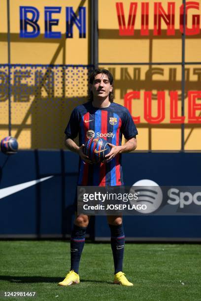 Barcelona's Spanish defender Hector Bellerin poses for a photograph during his official presentation at the Ciudad Deportiva near Barcelona on...