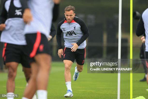 Liverpool's Brazilian midfielder Arthur Melo takes part in a training session at Liverpool training ground in Liverpool, northwest England, on...