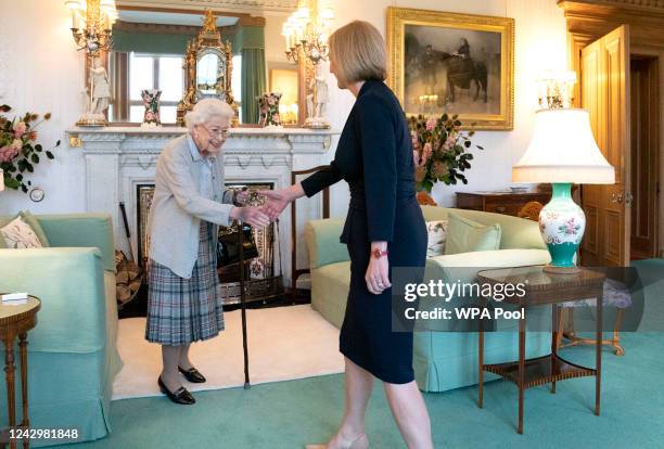 Queen Elizabeth greets newly elected leader of the Conservative party Liz Truss as she arrives at Balmoral Castle for an audience where she will be...