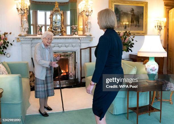 Queen Elizabeth greets newly elected leader of the Conservative party Liz Truss as she arrives at Balmoral Castle for an audience where she will be...