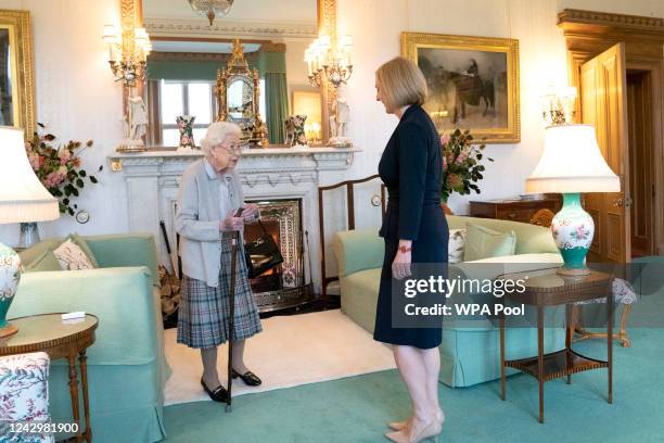 Queen Elizabeth greets newly elected leader of the Conservative party Liz Truss as she arrives at Balmoral Castle for an audience where she will be...