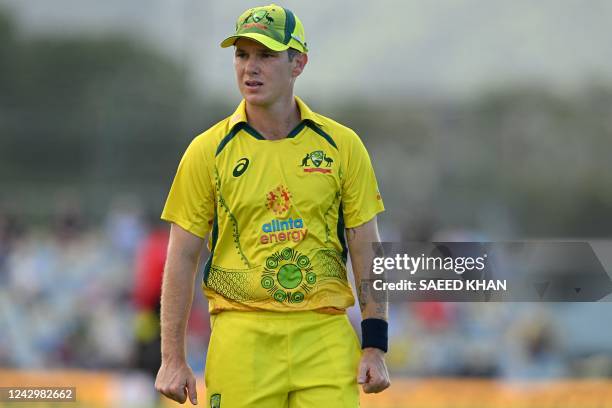 Australia's Adam Zampa fields at the boundary line during the first one-day international cricket match between Australia and New Zealand at the...