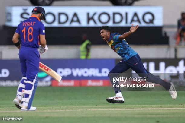 Sri Lanka's Dilshan Madushanka celebrates after bowling out India's Virat Kohli during the Asia Cup Twenty20 international cricket Super Four match...