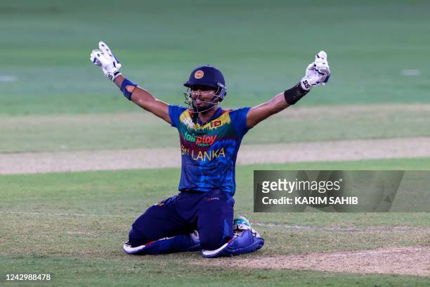 Sri Lanka's captain Dasun Shanaka celebrates their win during the Asia Cup Twenty20 international cricket Super Four match between India and Sri...