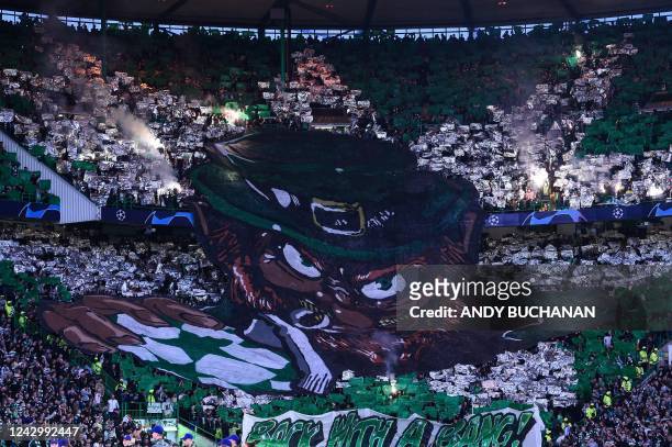 Celtic's fans cheer during the UEFA Champions League Group F football match between Celtic and Real Madrid, at the Celtic Park stadium, in Glasgow,...
