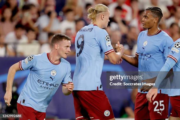 Erling Haaland of Manchester City, Manuel Akanji of Manchester City celebrates 0-1 during the UEFA Champions League match between Sevilla v...