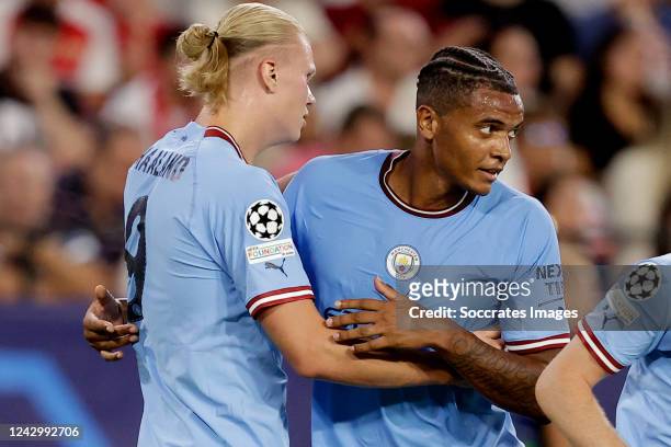 Erling Haaland of Manchester City, Manuel Akanji of Manchester City celebrates 0-1 during the UEFA Champions League match between Sevilla v...