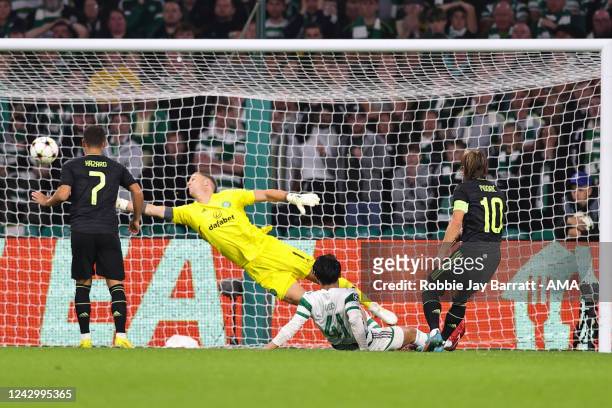 Luka Modric of Real Madrid scores a goal to make it 0-2 during the UEFA Champions League group F match between Celtic FC and Real Madrid at Celtic...