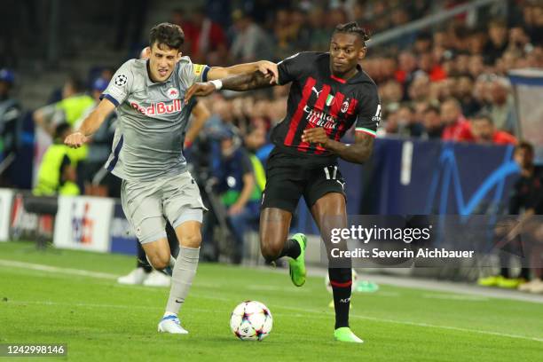 Nicolas Capaldo of Salzburg and Rafael Leao of Milan during the UEFA Champions League group E match between FC Red Bull Salzburg and AC Milan at Red...